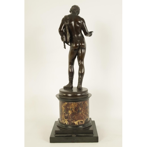 586 - A 19TH CENTURY PATINATED BRONZE SCULPTURE OF A SEMI NUDE CLASSICAL MALE FIGURE mounted on a veined b... 