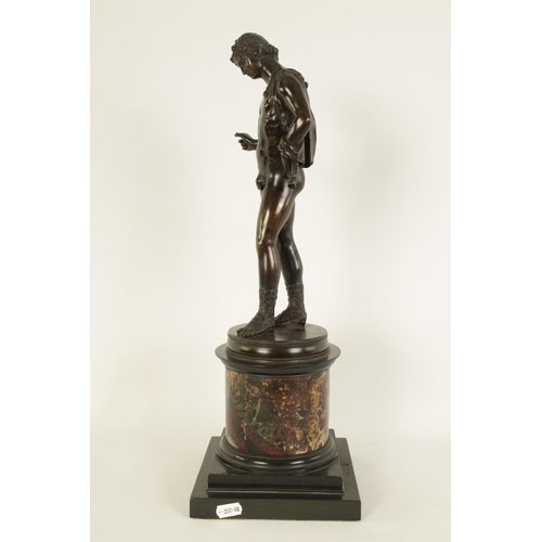 586 - A 19TH CENTURY PATINATED BRONZE SCULPTURE OF A SEMI NUDE CLASSICAL MALE FIGURE mounted on a veined b... 