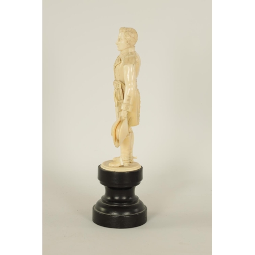 587 - A FINE 19TH CENTURY CARVED IVORY FIGURE OF THE DUKE OF WELLINGTON standing on a ebonised turned base... 