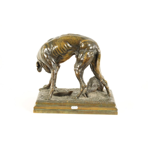 594 - H. FOUQUEZ. A LATE 19TH CENTURY FRENCH PATINATED BRONZE SCULPTURE depiciting a dog and a cat, mounte... 