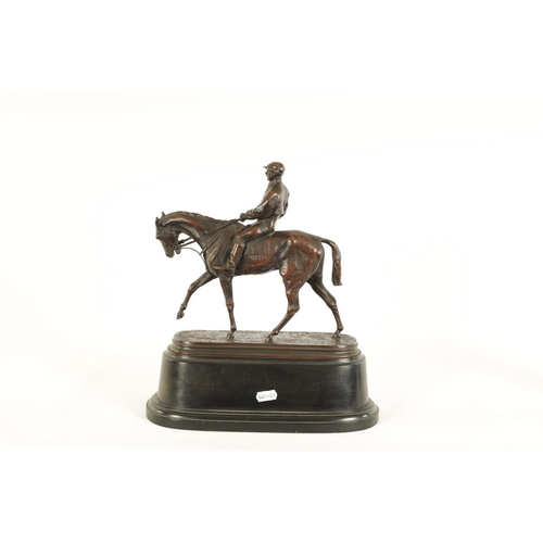 598 - AFTER P.J. MENE. A LATE 19TH CENTURY FRENCH BRONZE EQUESTRIAN SCULPTURE depicting a racehorse and jo... 