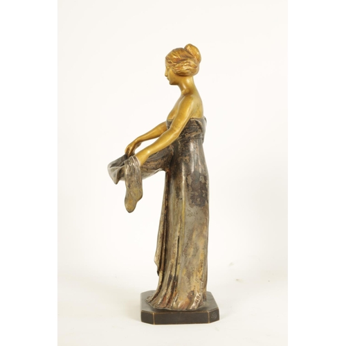 599 - MAURICE BOUVAL (1863-1916) AN ART NOUVEAU GILT AND SILVERED BRONZE FIGURE depiciting a young female ... 