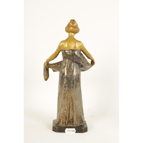 599 - MAURICE BOUVAL (1863-1916) AN ART NOUVEAU GILT AND SILVERED BRONZE FIGURE depiciting a young female ... 