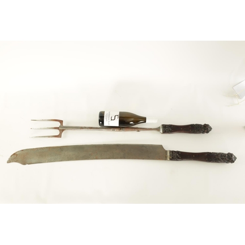 600 - A RARE GIANT PAIR OF LATE REGENCY EXHIBITION CARVING KNIFE AND FORK SET with substantial leaf-carved... 