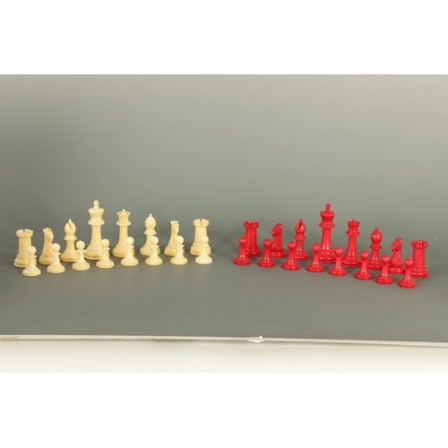 602 - A JACQUES & SONS STAUNTON PATTERN NEUTRAL AND RED STAINED IVORY CLUB SIZE CHESS SET in a fitted rose... 