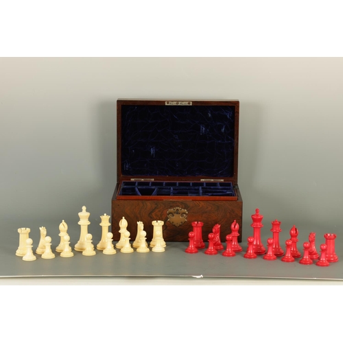 602 - A JACQUES & SONS STAUNTON PATTERN NEUTRAL AND RED STAINED IVORY CLUB SIZE CHESS SET in a fitted rose... 