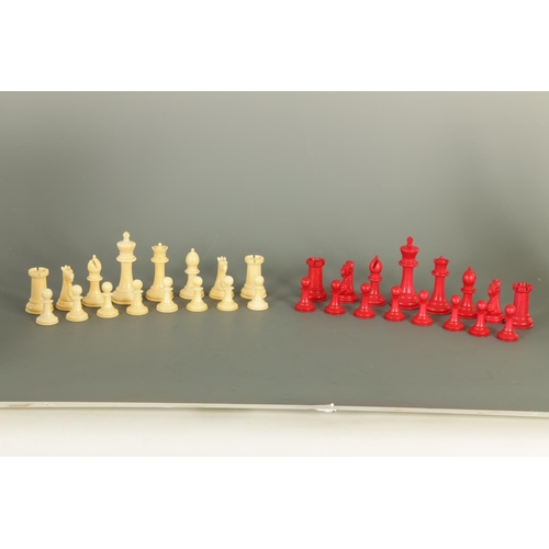 602 - A JACQUES & SONS STAUNTON PATTERN NEUTRAL AND RED STAINED IVORY CLUB SIZE CHESS SET in a fitted rose... 