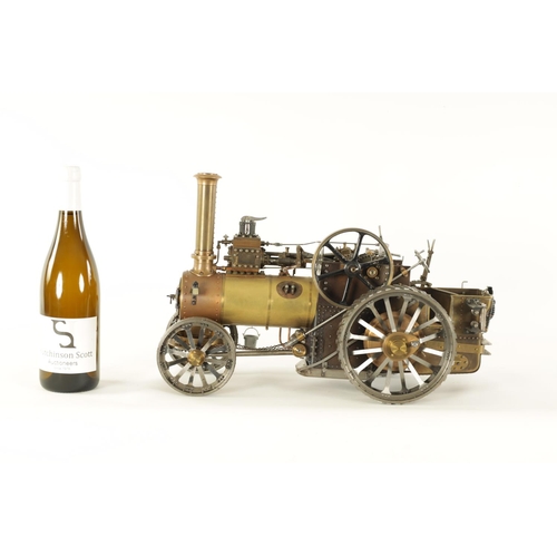 604 - A FINE HANDMADE LIVE-STEAM ENGINEER'S MODEL OF A ROAD TRACTOR constructed in bronze and steel with f... 