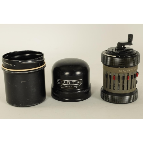 614 - A CURTA TYPE II CALCULATOR No. 523686 with original instruction booklets and metal case (11cm high)