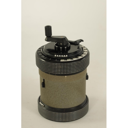 614 - A CURTA TYPE II CALCULATOR No. 523686 with original instruction booklets and metal case (11cm high)