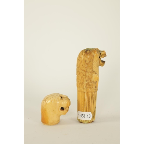 615 - AN EARLY GEORGIAN CARVED IVORY DAGGER HANDLE finely worked as an open-mouthed lion together with a G... 