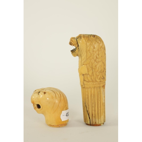 615 - AN EARLY GEORGIAN CARVED IVORY DAGGER HANDLE finely worked as an open-mouthed lion together with a G... 