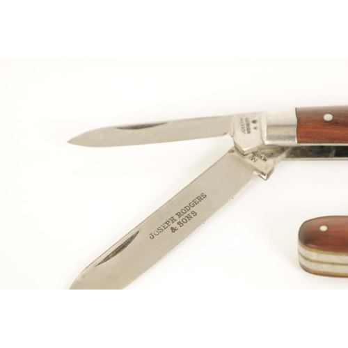 620 - TWO UNUSED JOSEPH RODGERS TWIN-BLADED FOLDING KNIVES with rosewood handles, the larger having the or... 