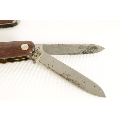 620 - TWO UNUSED JOSEPH RODGERS TWIN-BLADED FOLDING KNIVES with rosewood handles, the larger having the or... 