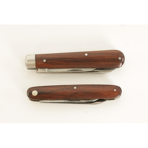 620 - TWO UNUSED JOSEPH RODGERS TWIN-BLADED FOLDING KNIVES with rosewood handles, the larger having the or... 