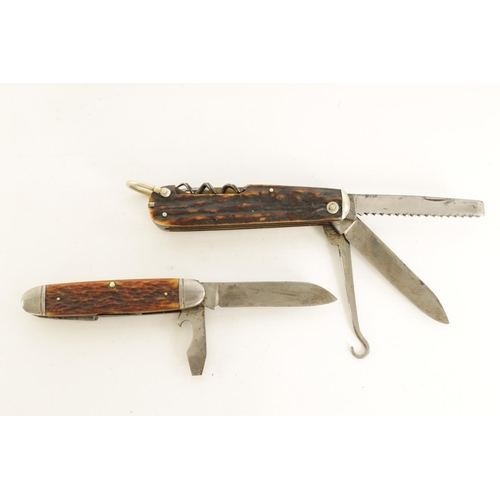 626 - TWO STAG HORN MULTI-BLADE FOLDING KNIVES the larger with eight tools signed 'T. HARROP, SHEFIELD' th... 