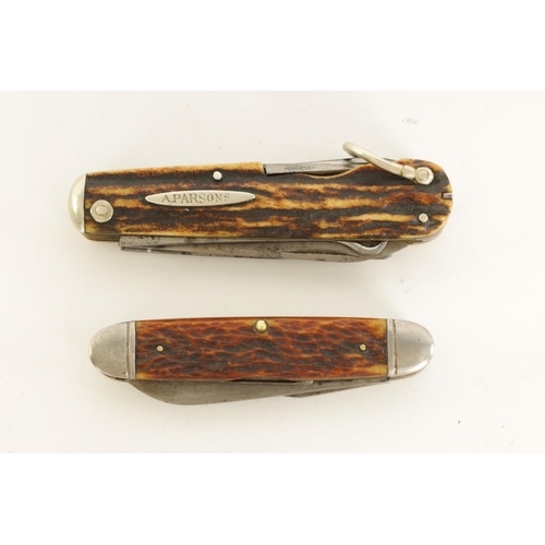 626 - TWO STAG HORN MULTI-BLADE FOLDING KNIVES the larger with eight tools signed 'T. HARROP, SHEFIELD' th... 