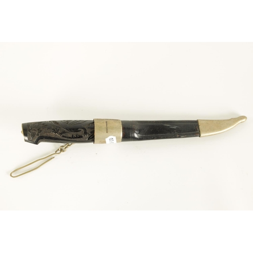 631 - A LATE 19TH CENTURY NORWEGIAN EBONY HANDLED KNIFE the handle relief carved depicting a dragon amidst... 