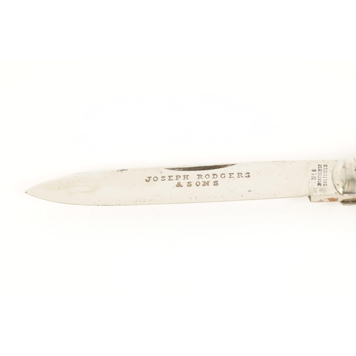 632 - AN UNUSED JOSEPH RODGERS LOCKING KNIFE WITH STAG HORN HANDLE fitted with a corkscrew, tapering trian... 