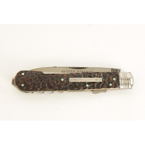 632 - AN UNUSED JOSEPH RODGERS LOCKING KNIFE WITH STAG HORN HANDLE fitted with a corkscrew, tapering trian... 