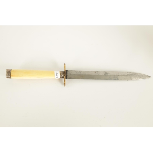 633 - A LATE 19TH CENTURY SILVER MOUNTED IVORY HANDLED DIRK with gilt brass cross guard and 23cm double-ed... 