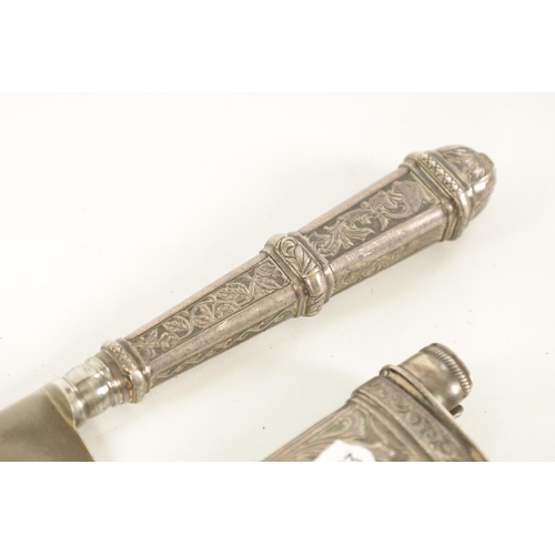 639 - TWO ARGENTINIAN SILVER GAUCHO KNIVES the larger with relief decoration depicting dogs within a carto... 