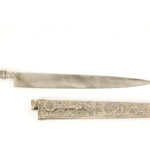 639 - TWO ARGENTINIAN SILVER GAUCHO KNIVES the larger with relief decoration depicting dogs within a carto... 