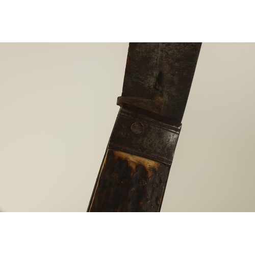 648 - AN OVERSIZED LATE 18TH CENTURY STAG-HORN HANDLED FOLDING KNIFE the handle constructed in four horn s... 