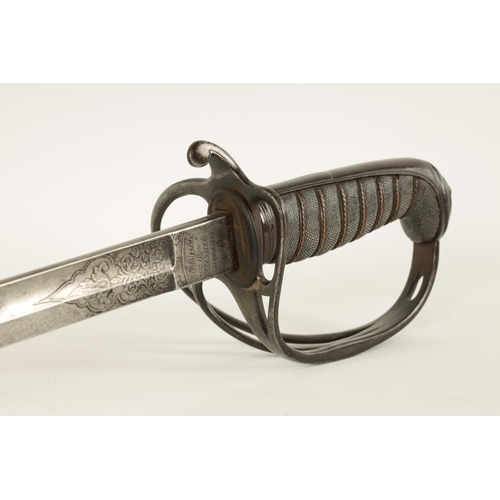 650 - A 19TH CENTURY OFFICERS ARTILLERY DRESS SWORD the 82cm fullered steel blade etched with scrolls and ... 