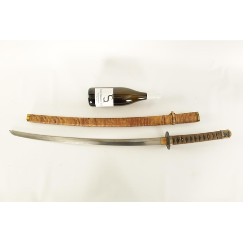 651 - AN EARLY 20TH CENTURY JAPANESE MILITARY SAMURAI KATANA SWORD the grip with cloth binding and gilt fl... 