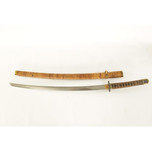 651 - AN EARLY 20TH CENTURY JAPANESE MILITARY SAMURAI KATANA SWORD the grip with cloth binding and gilt fl... 