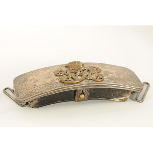 657 - TWO VICTORIAN SILVER MOUNTED OFFICER’S CROSS BELT POUCHES with engraved borders and mounted with a g... 