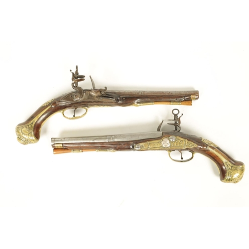 680 - I.H. DEOP, RIPOLL. A PAIR OF 18TH CENTURY BRASS MOUNTED SPANISH FLINTLOCK PISTOLS each fitted a two-... 