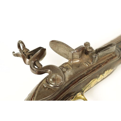 680 - I.H. DEOP, RIPOLL. A PAIR OF 18TH CENTURY BRASS MOUNTED SPANISH FLINTLOCK PISTOLS each fitted a two-... 