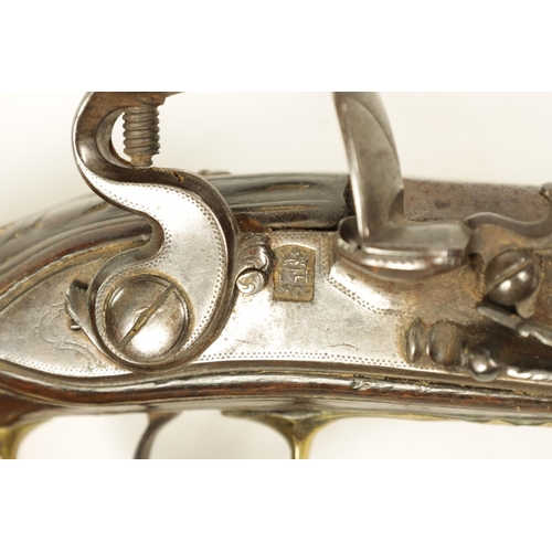 680 - I.H. DEOP, RIPOLL. A PAIR OF 18TH CENTURY BRASS MOUNTED SPANISH FLINTLOCK PISTOLS each fitted a two-... 