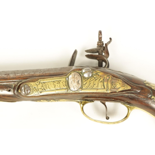 680 - I.H. DEOP, RIPOLL. A PAIR OF 18TH CENTURY BRASS MOUNTED SPANISH FLINTLOCK PISTOLS each fitted a two-... 