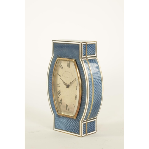 683 - AN UNUSUAL ART DECO SILVER-GILT AND BLUE WHITE EDGED GUILLOCHE ENAMEL COMBINED DESK CLOCK/STAMP BOX ... 