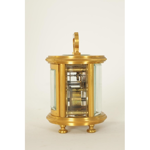 686 - A LATE 19TH CENTURY GILT BRASS FRENCH MINIATURE CYLINDRICAL CARRIAGE CLOCK the engine-turned masked ... 