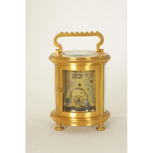 686 - A LATE 19TH CENTURY GILT BRASS FRENCH MINIATURE CYLINDRICAL CARRIAGE CLOCK the engine-turned masked ... 