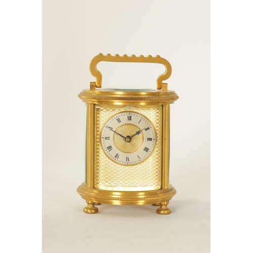 686 - A LATE 19TH CENTURY GILT BRASS FRENCH MINIATURE CYLINDRICAL CARRIAGE CLOCK the engine-turned masked ... 