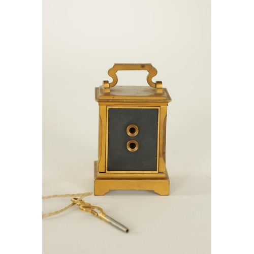 687 - A FRENCH MINIATURE GILT BRASS AND ENAMEL PANELLED CARRIAGE CLOCK CIRCA 1900 the case with hinged han... 