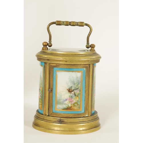 690 - A LATE 19TH CENTURY FRENCH OVAL MINIATURE PORCELAIN PANELLED CARRIAGE CLOCK the moulded brass case e... 