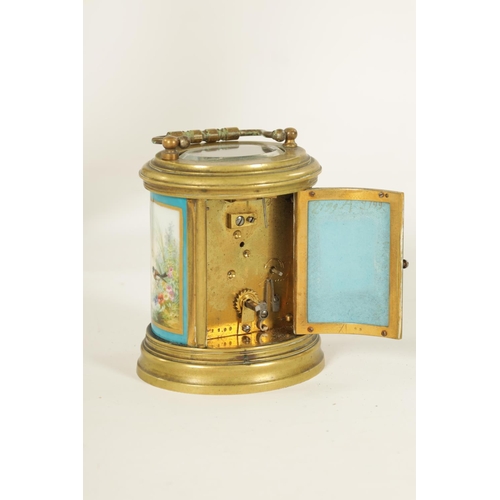 690 - A LATE 19TH CENTURY FRENCH OVAL MINIATURE PORCELAIN PANELLED CARRIAGE CLOCK the moulded brass case e... 