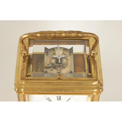 698 - DROCOURT, PARIS. A 19TH CENTURY BRASS GORGE-CASE REPEATING CARRIAGE CLOCK the white enamel dial with... 