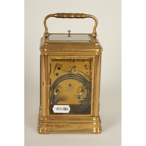 698 - DROCOURT, PARIS. A 19TH CENTURY BRASS GORGE-CASE REPEATING CARRIAGE CLOCK the white enamel dial with... 