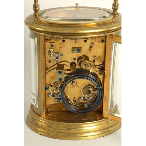 705 - DROCOURT. A 19TH CENTURY FRENCH OVAL CASED GRAND SONNERIE REPEATING CARRIAGE CLOCK the moulded brass... 