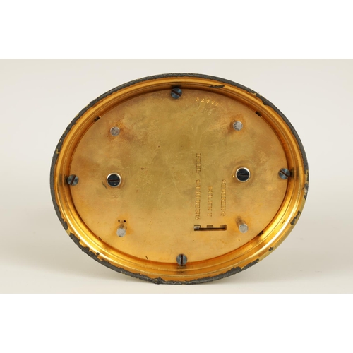 705 - DROCOURT. A 19TH CENTURY FRENCH OVAL CASED GRAND SONNERIE REPEATING CARRIAGE CLOCK the moulded brass... 