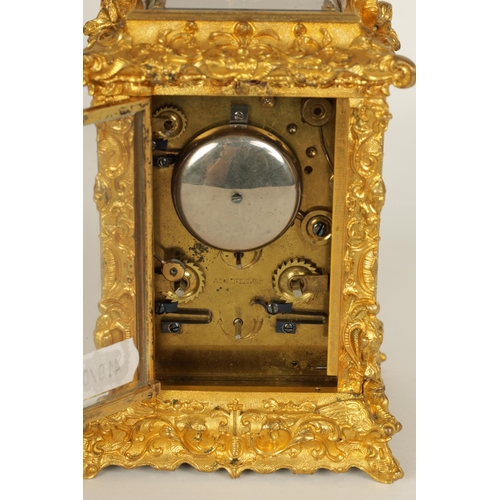 712 - A FINE MID 19TH CENTURY GILT BRASS FRENCH ROCOCO REPEATING CARRIAGE CLOCK WITH ALARM OF SMALL SIZE -... 