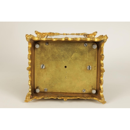 712 - A FINE MID 19TH CENTURY GILT BRASS FRENCH ROCOCO REPEATING CARRIAGE CLOCK WITH ALARM OF SMALL SIZE -... 