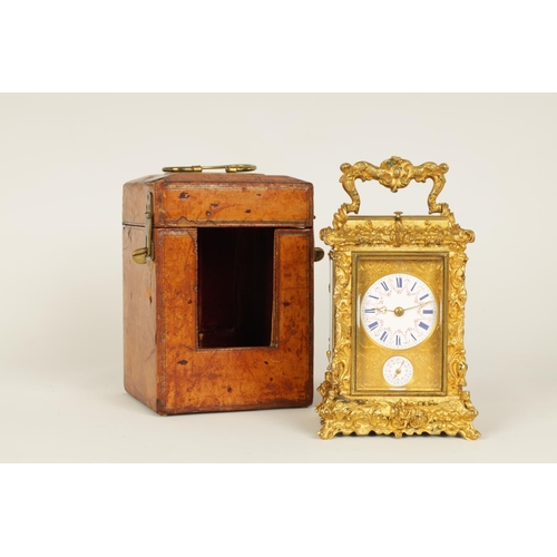 712 - A FINE MID 19TH CENTURY GILT BRASS FRENCH ROCOCO REPEATING CARRIAGE CLOCK WITH ALARM OF SMALL SIZE -... 